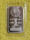 1 troy ounce fine silver bar featuring a Morgan Dollar design produced by the...