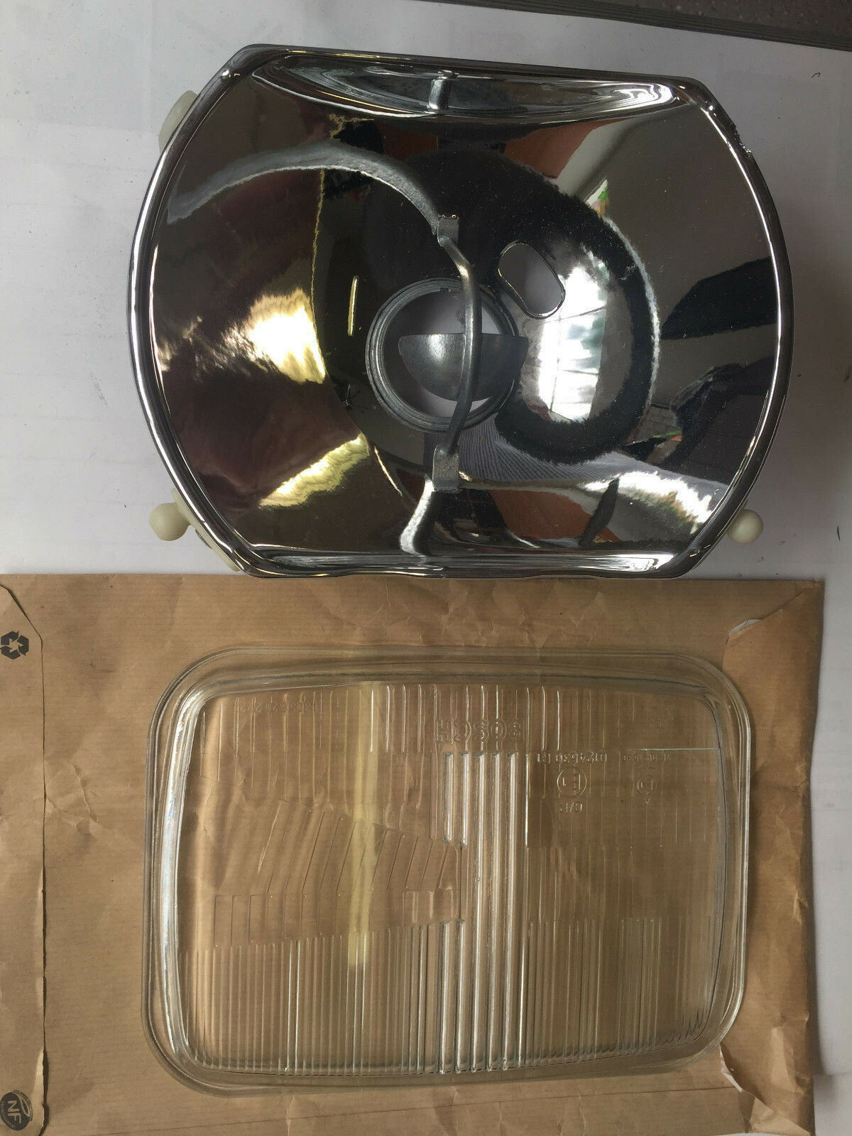 Phare Bosch gauche pour fourgon Mercedes 207 à 1113 optique vintage avant 1977-1995