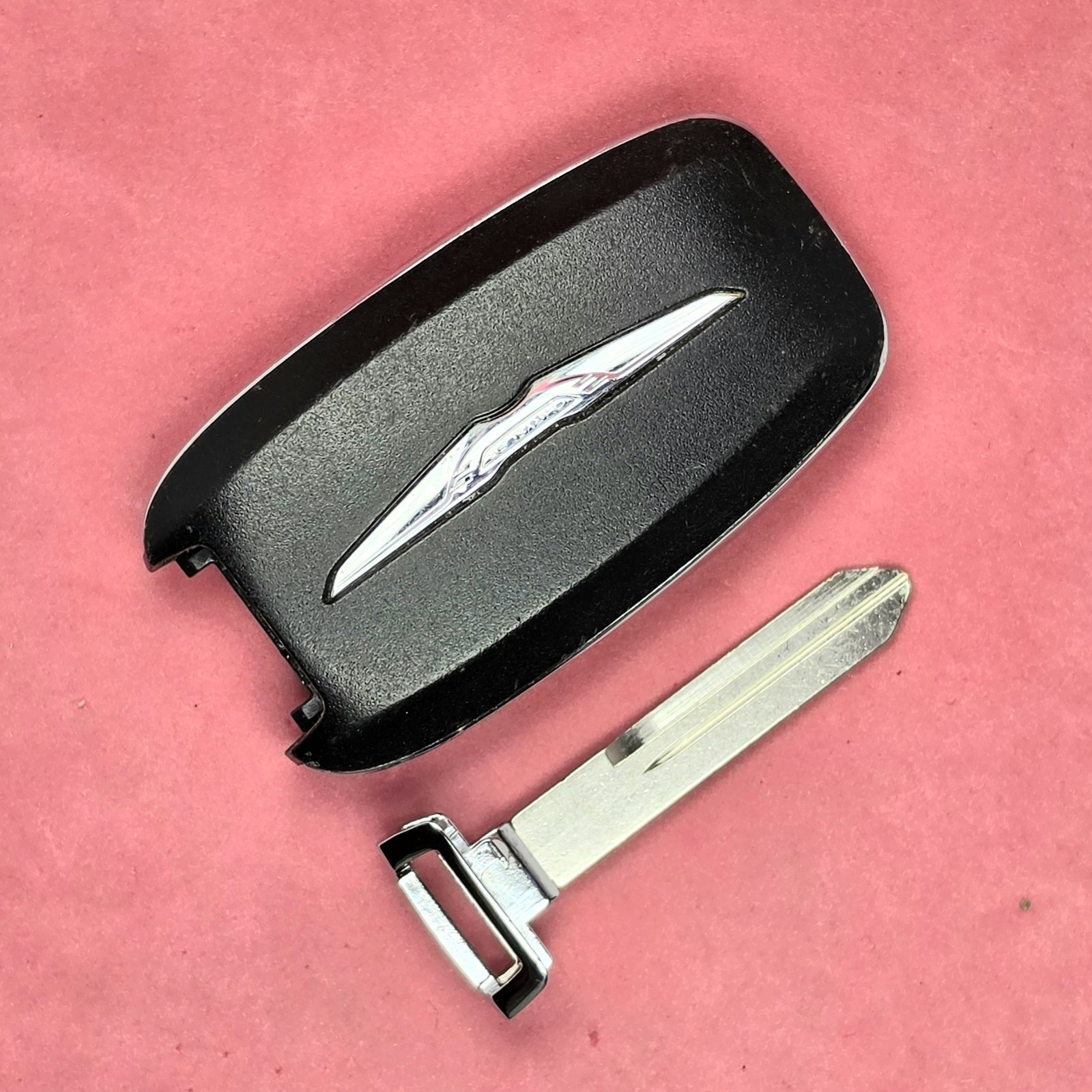 M3N-97395900 - Unlocked OEM Chrysler Pacifica Smart Key 7B worn condition - second product detail image