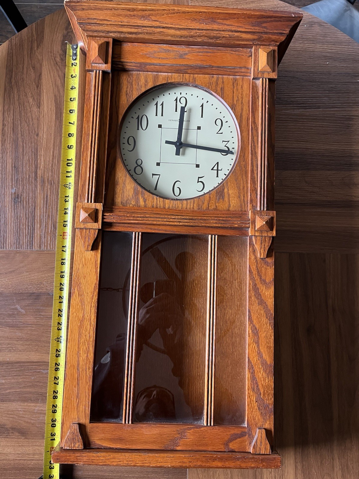 32.5” Large Howard Miller Ashlee II Oak Pendulum Chiming Wall Clock. # 620-185