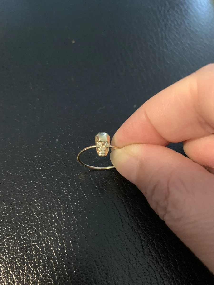 Skull ring shop with diamond eyes