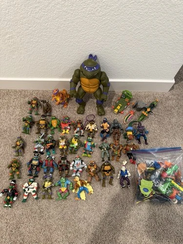 Vintage TMNT Lot – 35 Figures + Giant 12” Donatello, Weapons, Vehicles 1988–1995