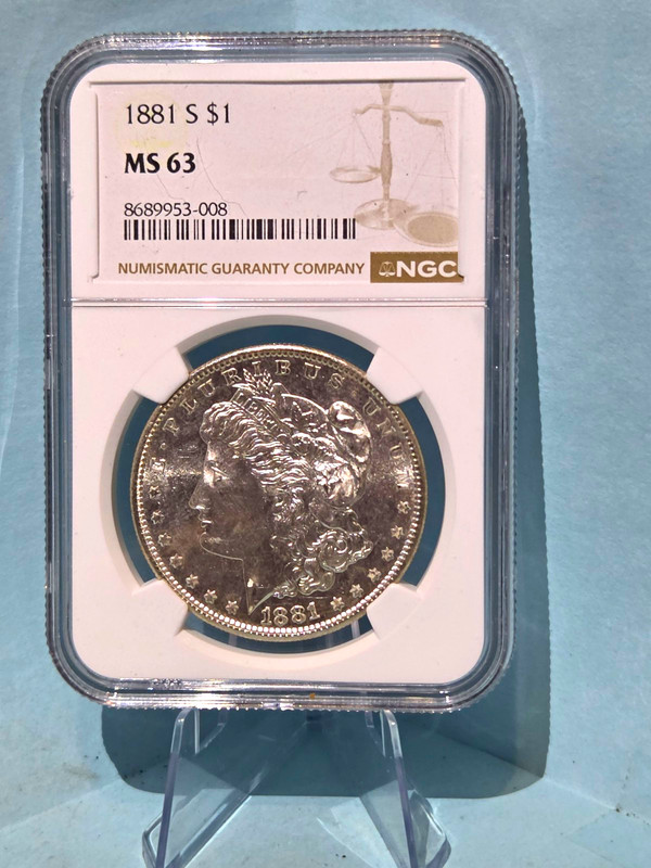 1881-S Morgan Silver Dollar $1 NGC MS63, 90% Silver 10% Copper