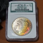 1885 O Morgan Silver Dollar NGC MS63 Rainbow Toned Binion Collection