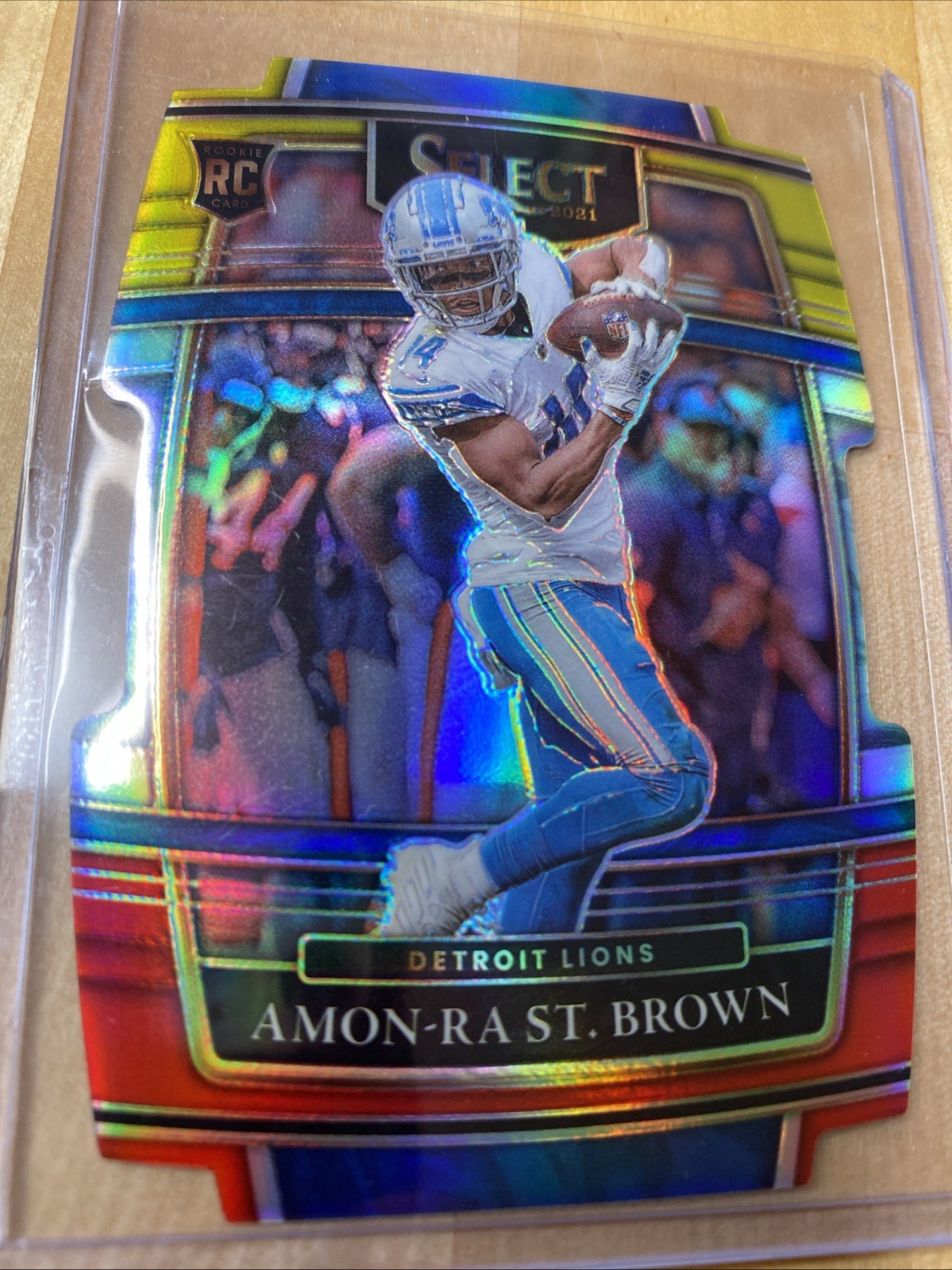2021 Panini Select - Amon-Ra St. Brown #73 Red & Yellow Prizm Die-Cut (RC)
