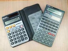 Vintage Calculator Casio FX-115D and Sharp Elsi Mate EL-480G Working Solar
