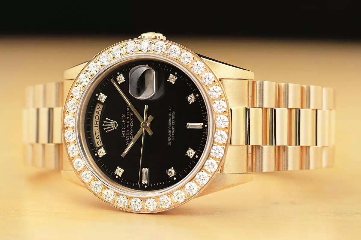 Rolex Oyster Perpetual Black Face/Diamond Bezel Rolex in 18k