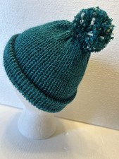 Beanie Knitted With Dark Green Yarn With Variegated Pom