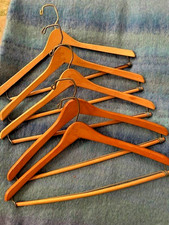 A lot of Five Vintage Wood Hanges for 2 piece Suits or coats