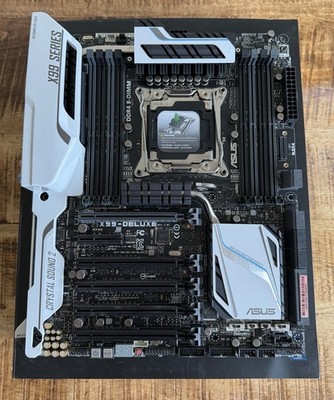 Asus X99-Deluxe Intel 2011 socket Motherboard for parts not working/bent pins