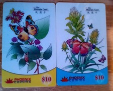 2 Phonecards Depicting Very Colourful Butterflies On Flowers & Foliage.