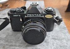 Pentax MV1 SLR Film Camera with standard lens. 