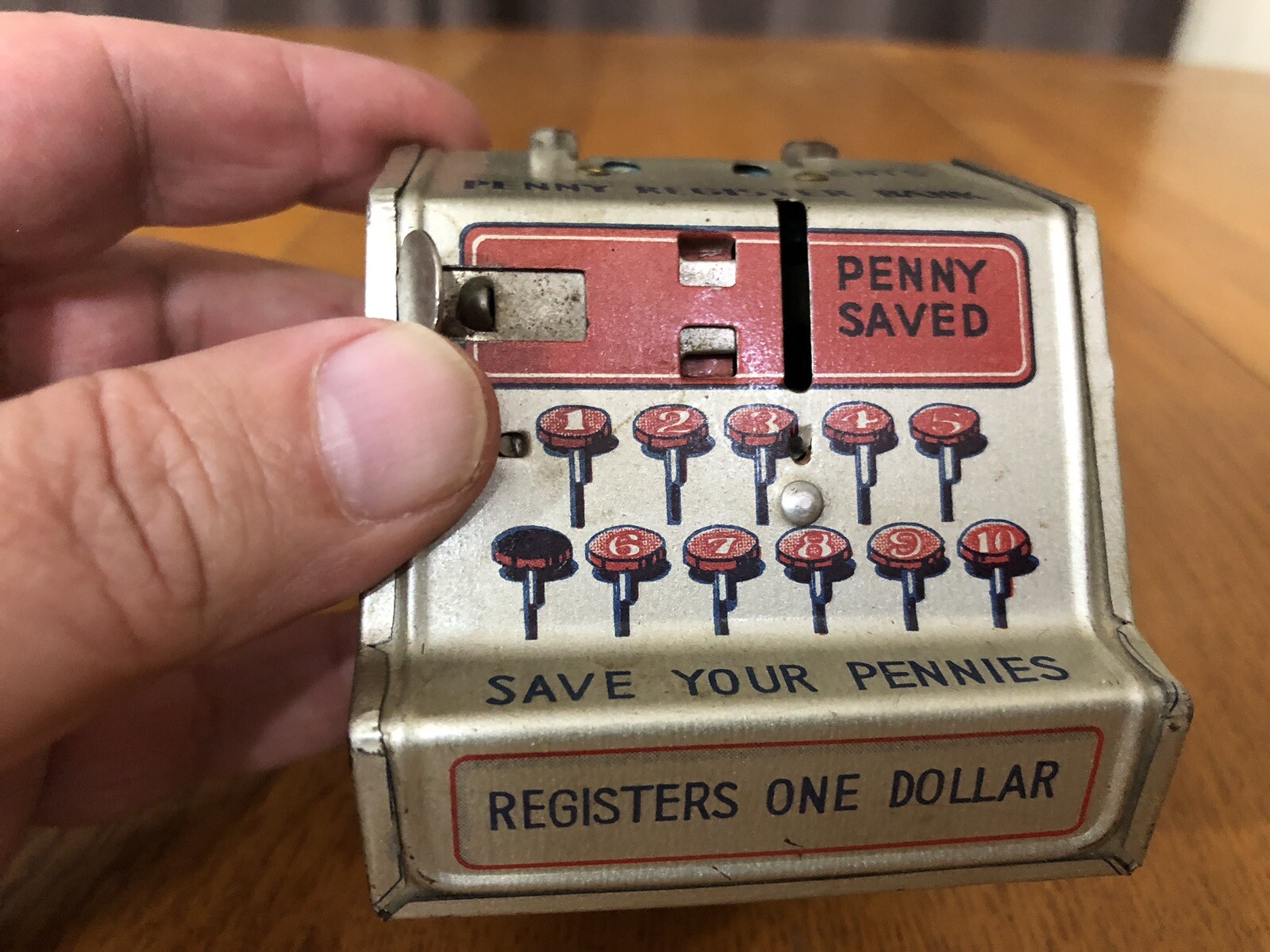 как выглядит VINTAGE LINE MAR TOYS TIN LITHO PENNY REGISTER COIN BANK MADE IN JAPAN фото