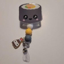 Badge Reel Sushi Roll With Charm