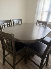 8-Piece Dark Espresso Wood Dining Table Set with Storage And Leaf.