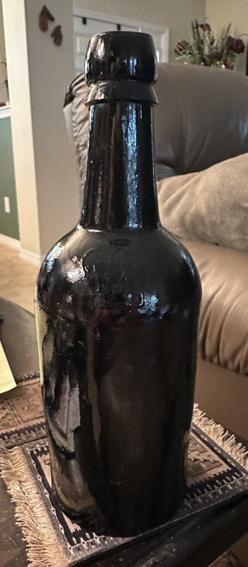 Vintage dark brown glass beer bottle