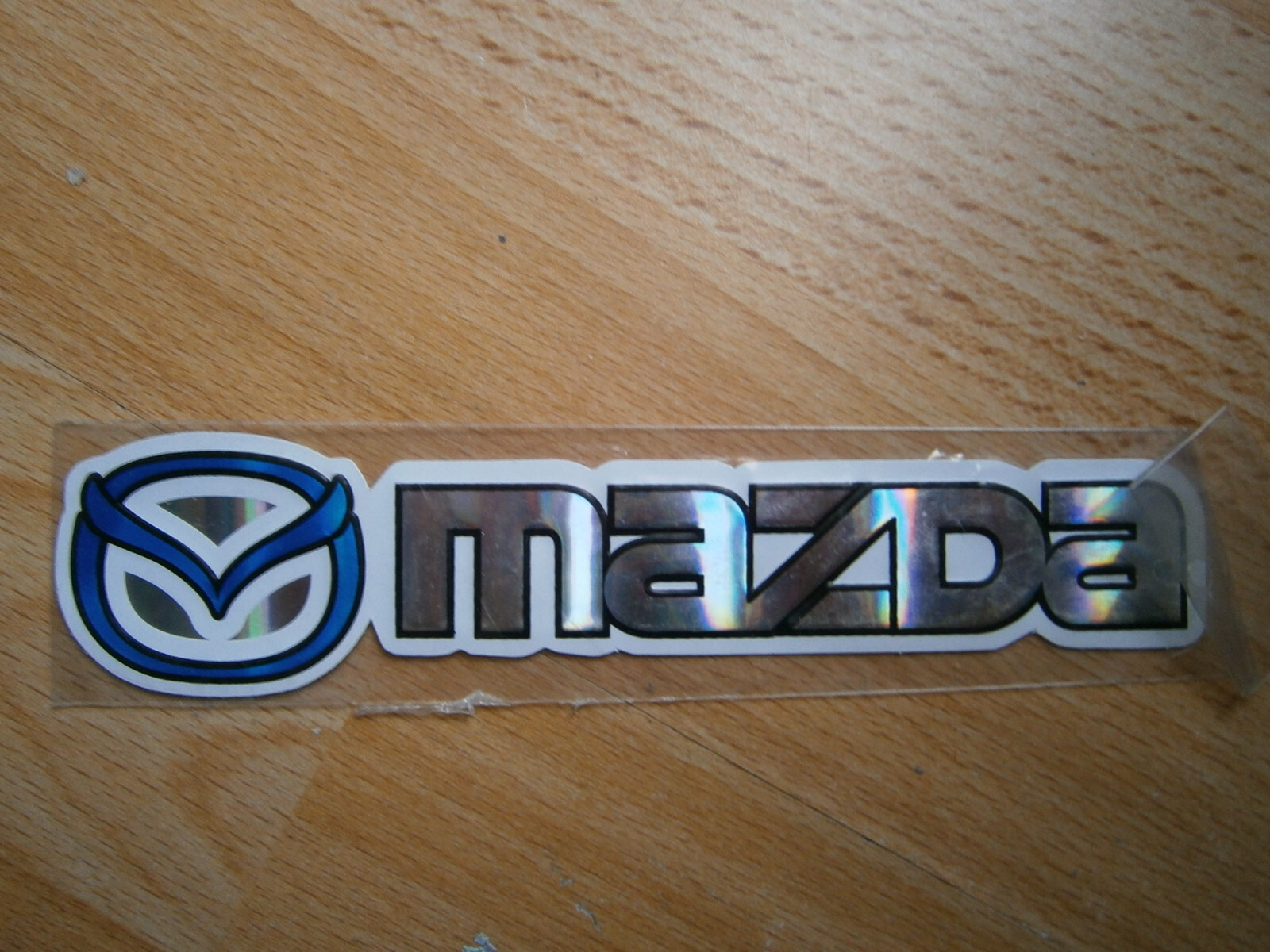 Mazda mit Symbol blau