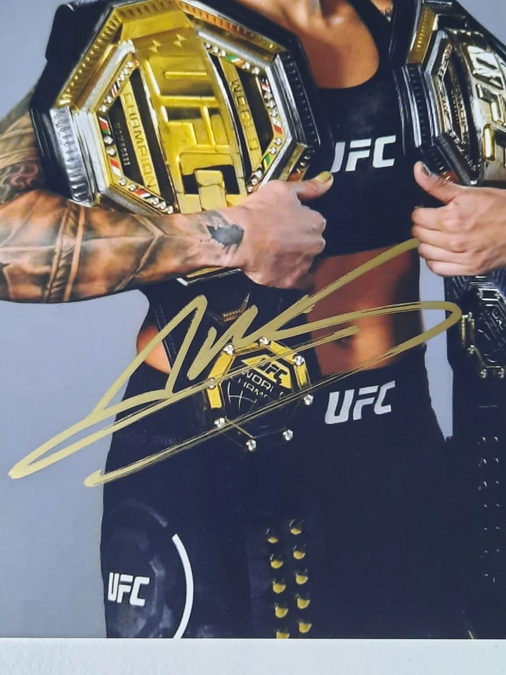 Foto automática 8x10 de tinta dorada firmada por cinturones Amanda Nunes UFC D Foto 2 de 4