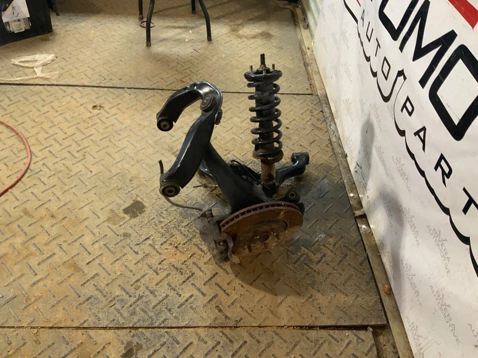 Nissan Xterra 2005 2006 07-2015 pasajero delantero suspensión de rodilla fabricante de equipos originales 194 k millas Foto 3 de 4