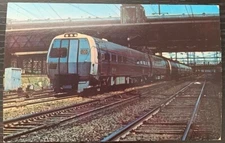 PENN STATION METROLINER LEAVING TRENTON NEW JERSEY 1970 COLOR POSTCARD UNUSED EX