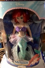 the little mermaid special edition brass key porcelain doll