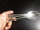 3 BEAUTIFUL SILVER OR ALLOY SPOONS, SO MANY PUNCHES THAT I do not know decipher