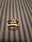 CROWN PIN CLEAR AND GREEN PRONG SET GOLD FINISH ALL THERE AND CLEAR NO ISSUES  — photo 2