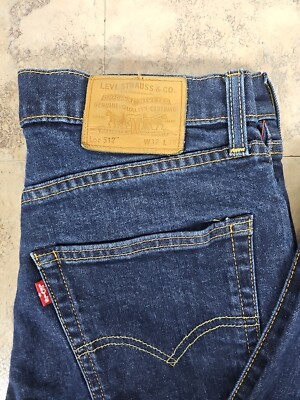 LEVIS 512 PREMIUM BIG E VINTAGE LEATHER PATCH Slim Tapered Jeans