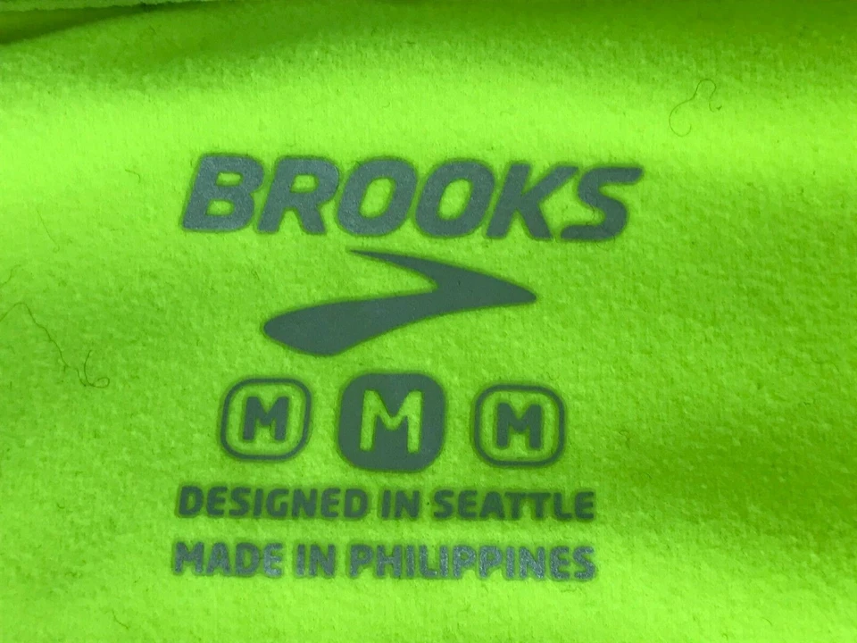 Pullover Brooks Running para mujer con media cremallera medio amarillo iluminador de neón Foto 3 de 4