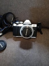 OLYMPUS OM-D Mirrorless single-lens camera with telephoto lens 