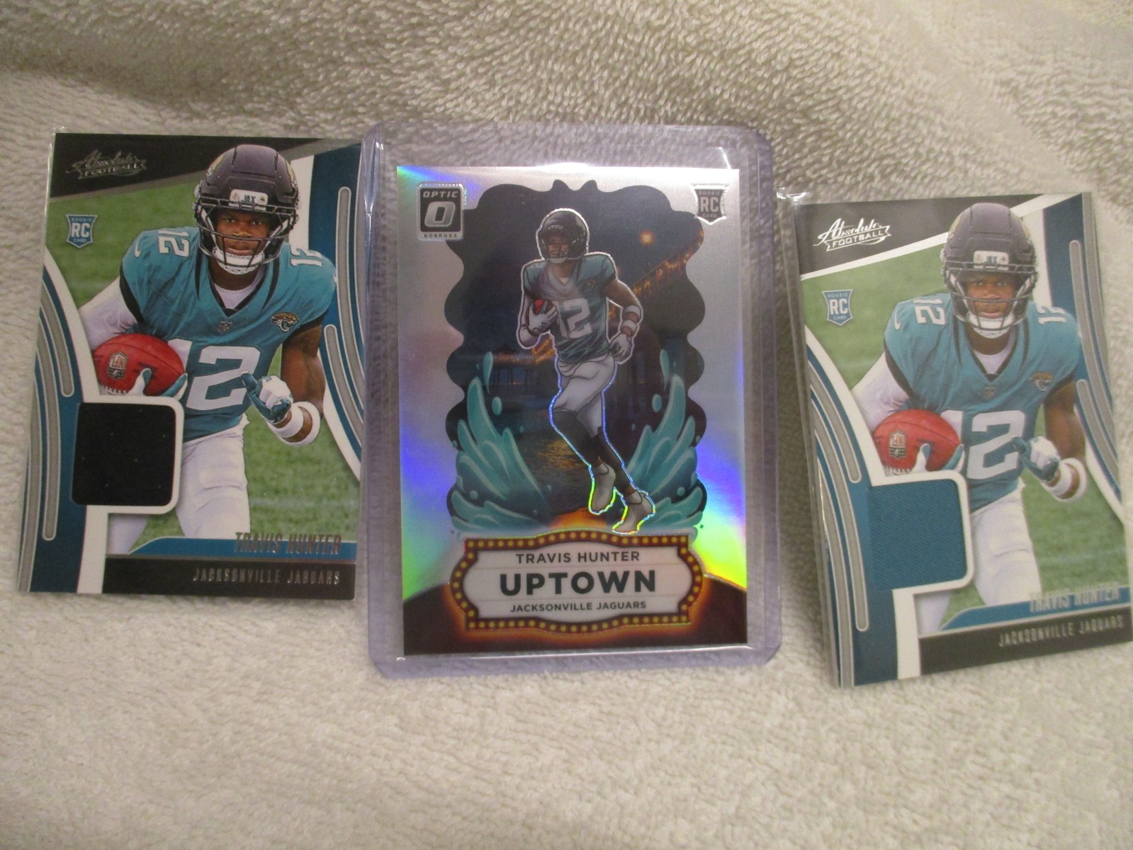 2025 Panini Donruss Optic Uptown Travis Hunter Jaguars