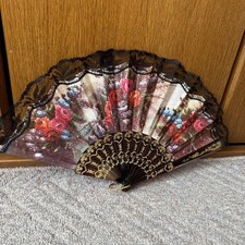 Spanishmade floral lace fan with wood frame, black lace design, used
