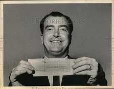 1968 Press Photo John Germann poses with check in New York - tub02022