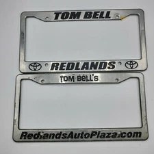 2x Tom Bell Toyota Redlands California Plastic Dealership License Plate Frame