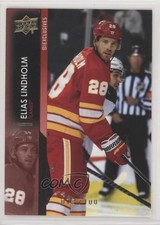 2021-22 Upper Deck Series 2 UD Exclusives 72/100 Elias Lindholm #277 1e05