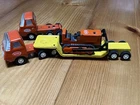 2 Vintage Tiny Tonka Trucks with 1 Lowboy Trailer & 1 Bulldozer. Classic toys