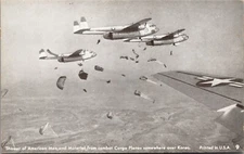 PC Shower of American Men and Material from Combat Cargo Planes Over Korea