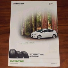 TOYOTA PRIUS BRIDGESTONE NEUMÁTICOS PUBLICIDAD IMPRESA REVISTA ANUNCIO SECUOYA ANTIGUA