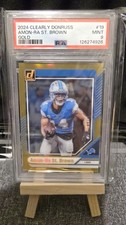 2024 Panini Clearly Donruss Amon-Ra St Brown Gold /10 PSA 9