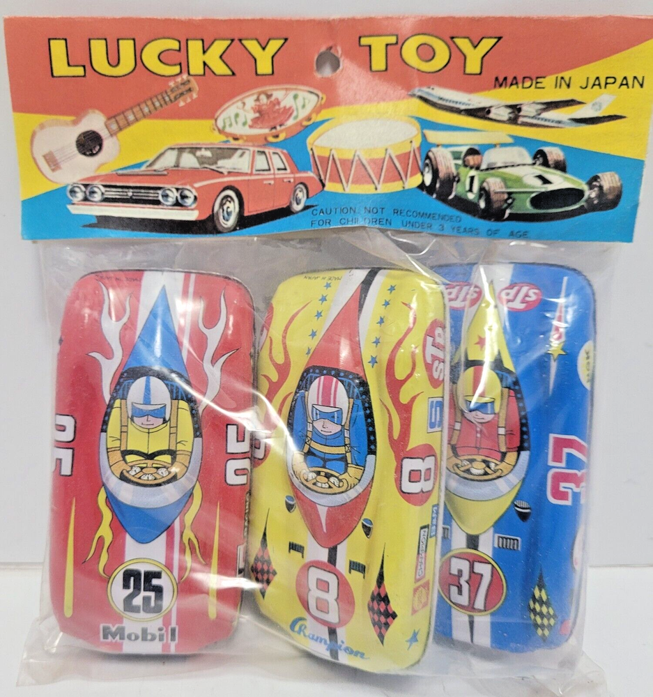 VINTAGE LUCKY TOY JAPAN TIN MOBIL STP CHAMPION RACE CARS ***NEW IN PACKAGE***