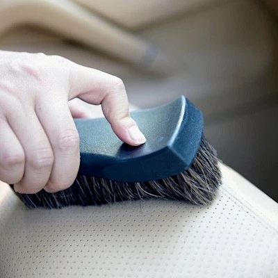Proper vinyl care relies on an upholstery brush to remove dirt from perforated upholstery.