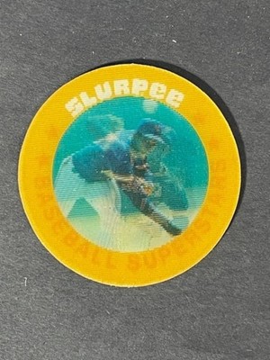 1986 Slurpee Triple Stars Coins East Region Orange Back (GOODEN) # I  - MT