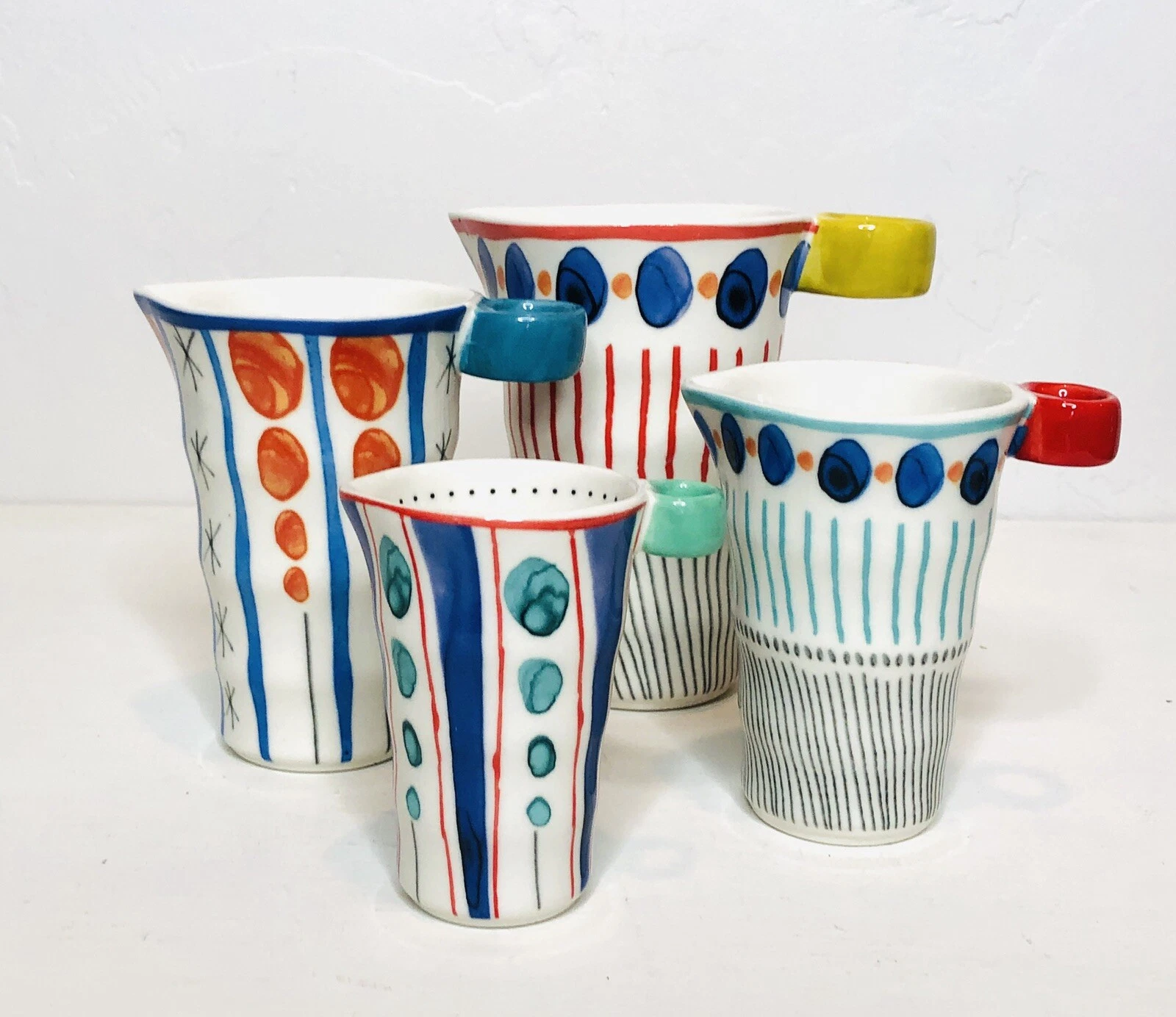 ANTHROPOLOGIE Set 4 Hand Painted Tall Ceramic Measuring Pitcher Cups Nesting