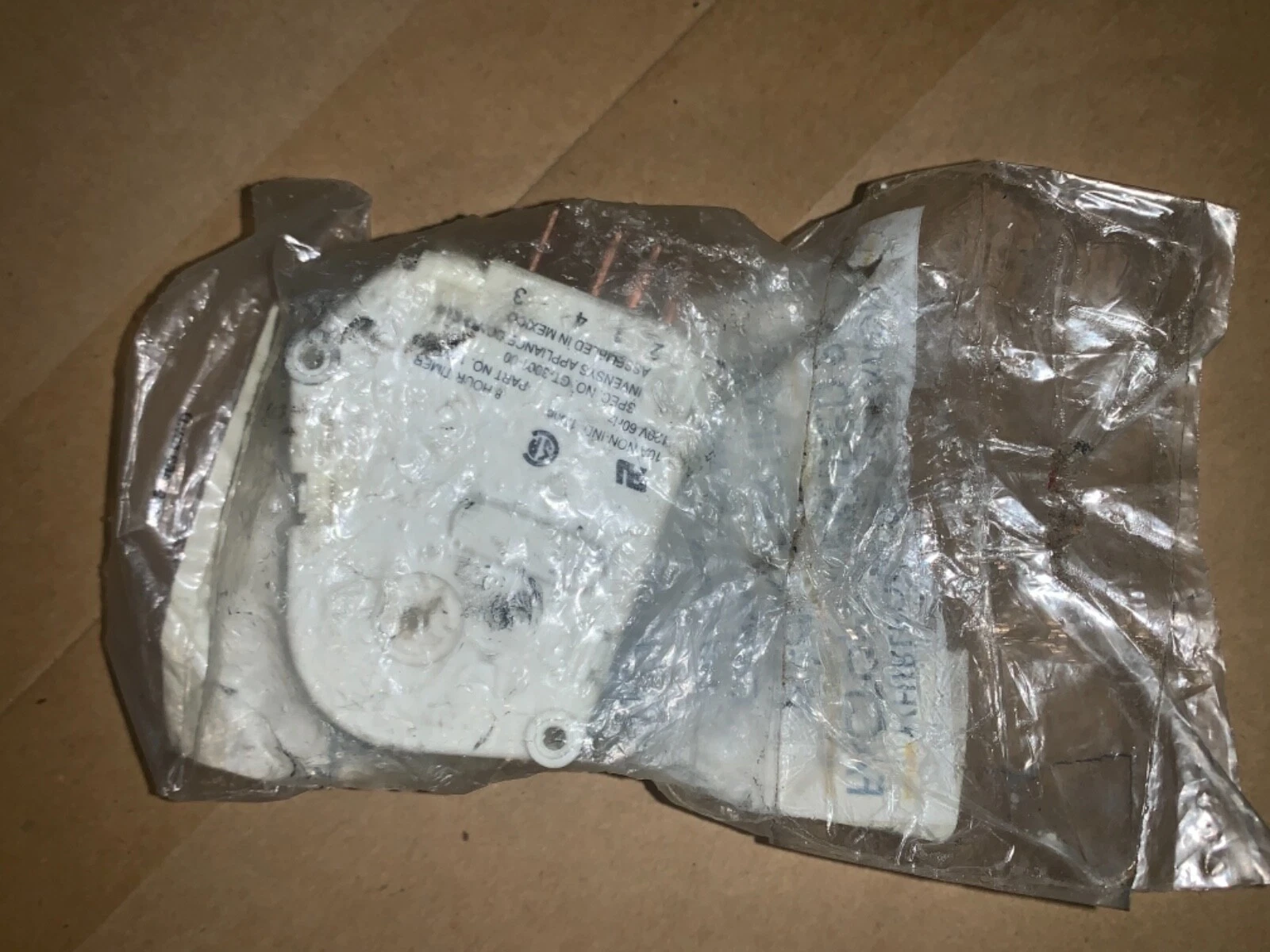 67001036 OEM Whirlpool refrigerator Defrost timer ( old stock)