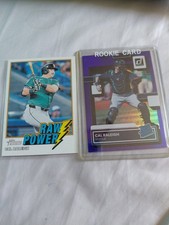 2 Cal Raleigh cards 1 purple rookie and 1 raw power insert