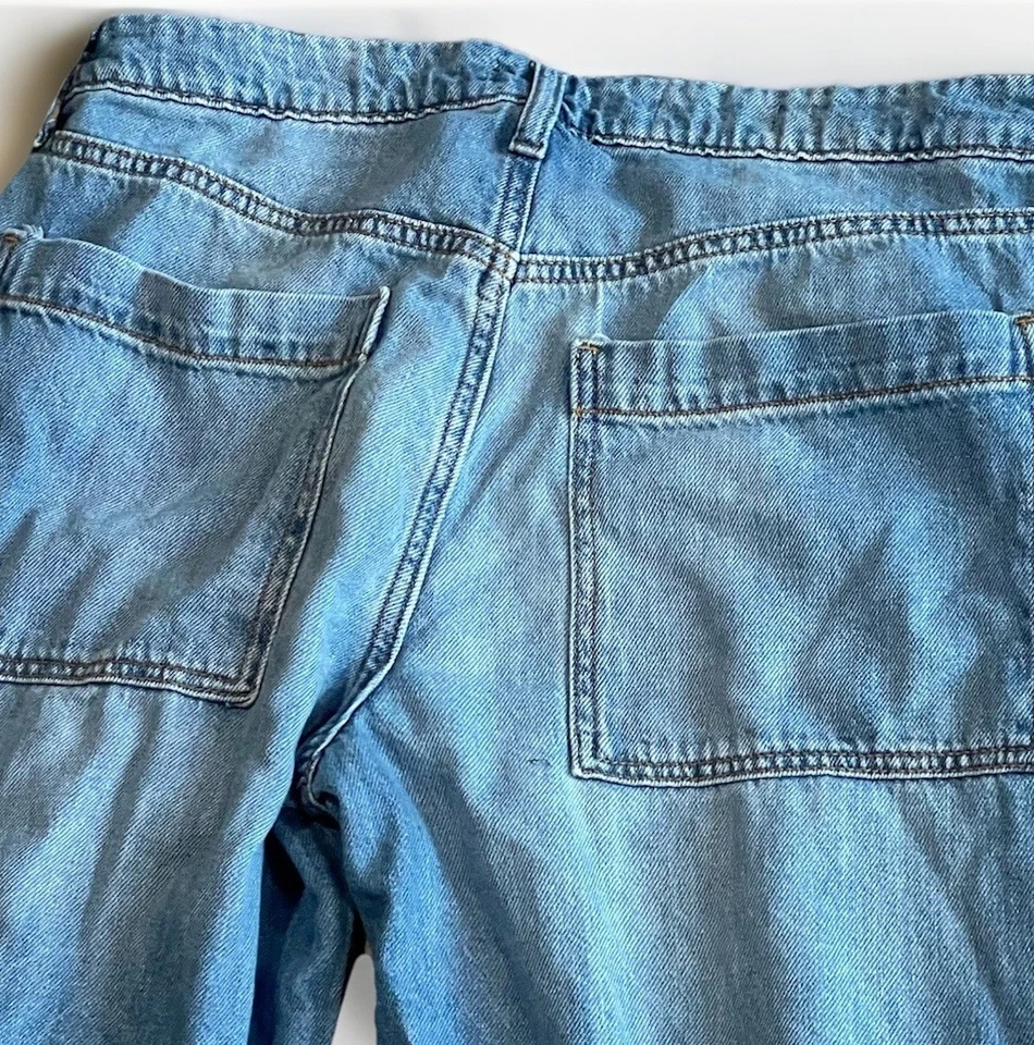 Pantalones de mezclilla utilitarios holgados de tiro medio para mujer Wild Fable lavado medio 8R Foto 3 de 4