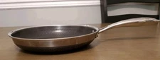 HexClad Hypbrid Nonstick Stainless Steel 10" Frying Pan With No Lid Has Wear