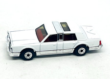 Matchbox International Lincoln Town Car in white, chrome strap, black base mint!