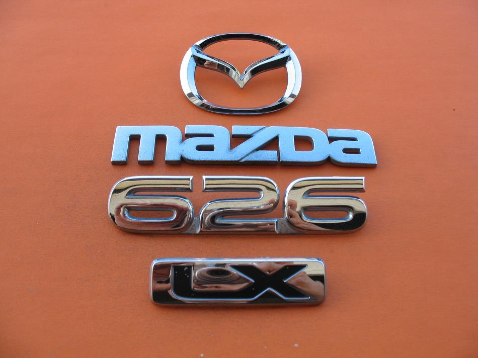 98 99 00 01 02 MAZDA 626 LX REAR TRUNK LID EMBLEM LOGO BADGE SIGN