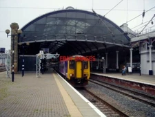 PHOTO  NORTHERN RAIL CLASS 156 UNIT 156438 WAITS AT NEWCASTLE'S PLATFORM 5 ON 27